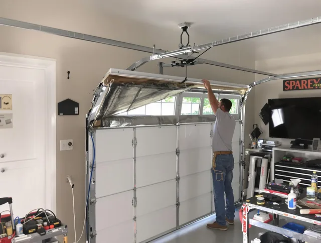 Garage door section replacement by Worthington Garage Door Repair in Worthington