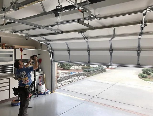 Garage door track repair service by Worthington Garage Door Repair in Worthington